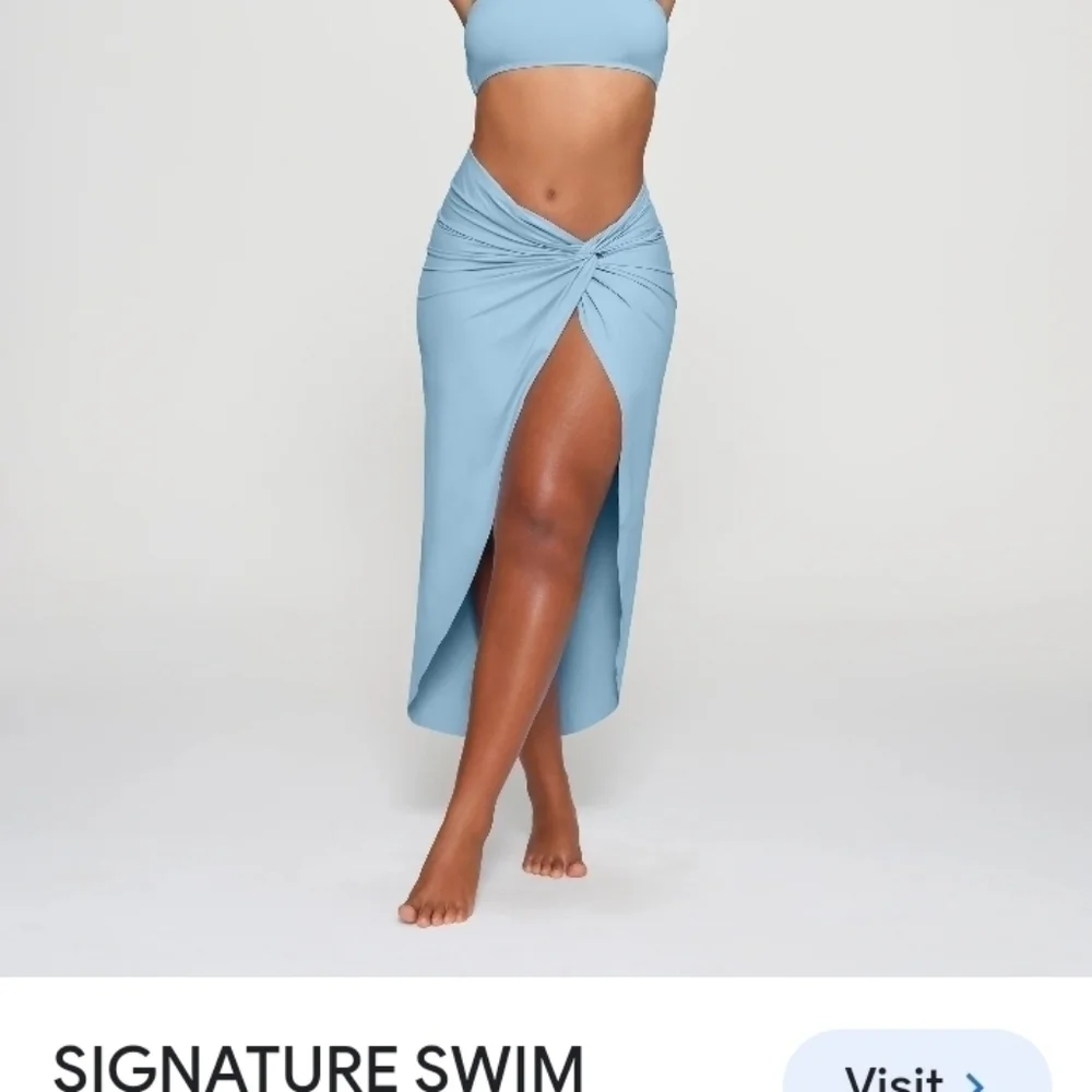 Skims Sorang turquoise cover up